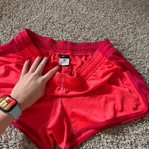 Nikes womans shorts pink size medium